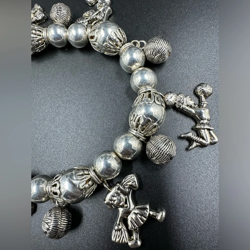 Best Signed Vintage Silver Cheer Leader Ornate Beaded stretch Charm Bracelet